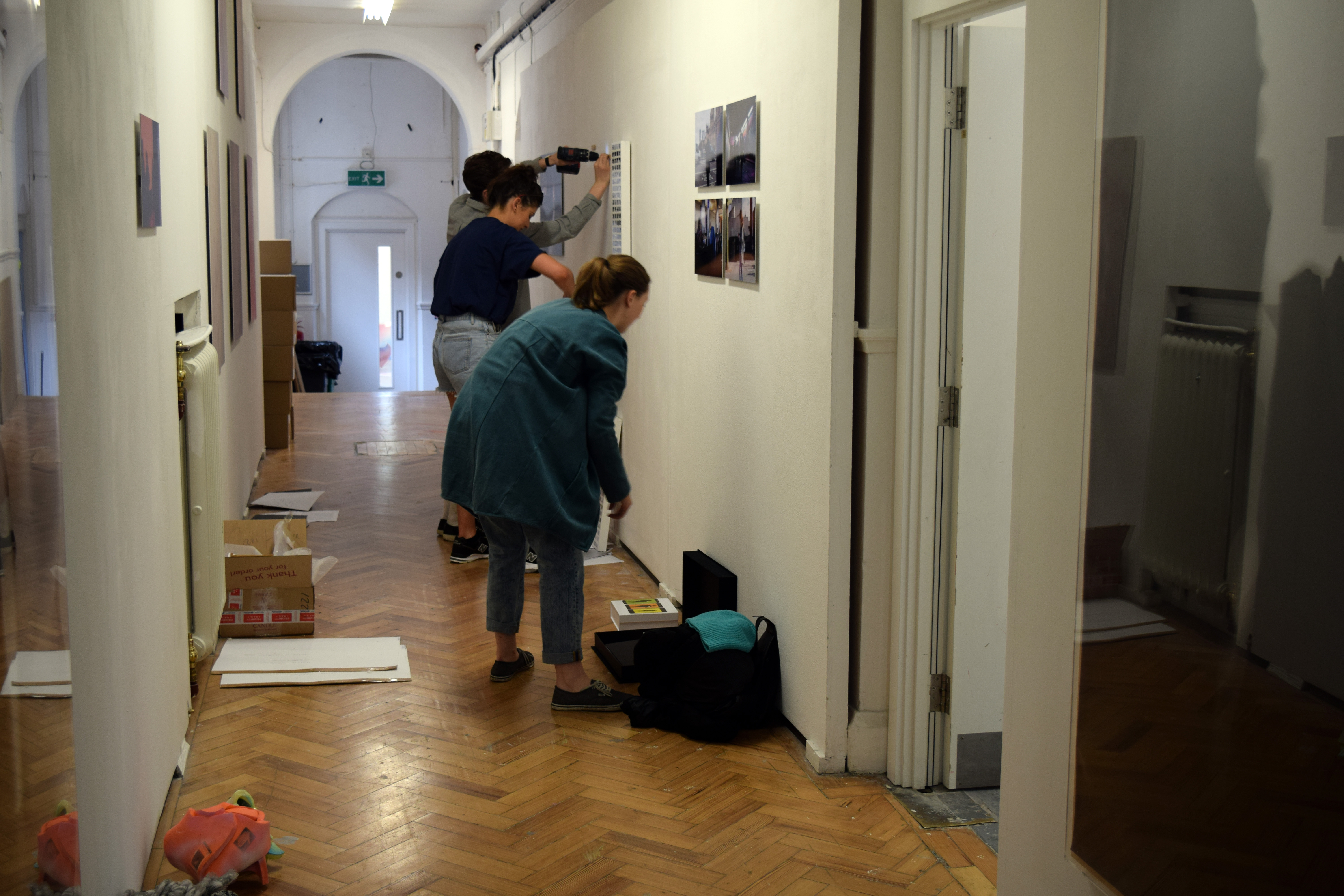 BA Photography students hanging in the corridor