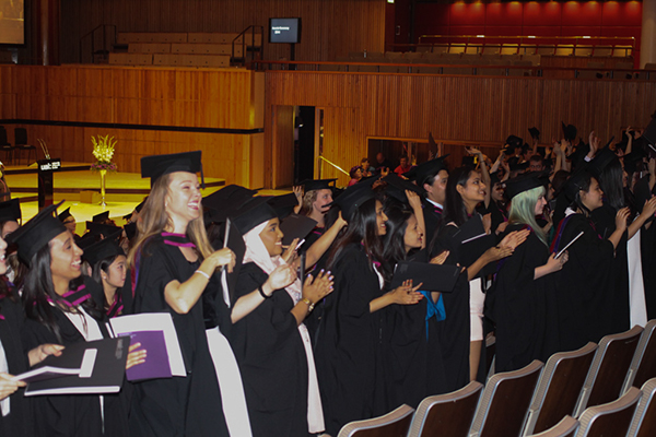 Students in the Royal Festival Hall turn to thank their families and loved ones who had come out to support them.