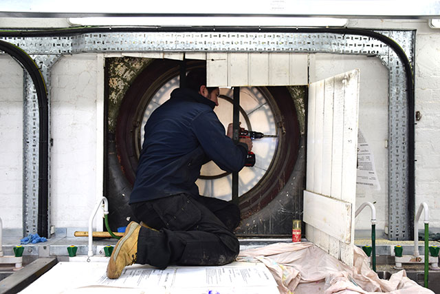 Removing the clock from it’s casing.