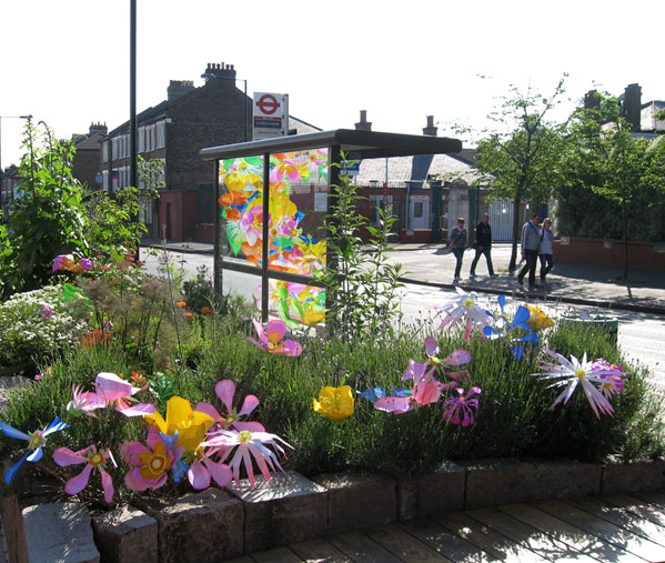 Community bus stop floral installation piece, with floral digital print design for the bus shelter by Hannah Miles