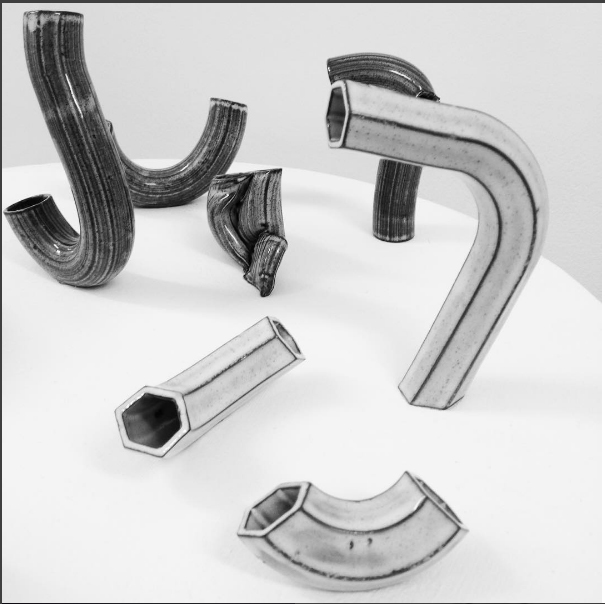 Tas' ceramic tubes on display in Raum Gallery