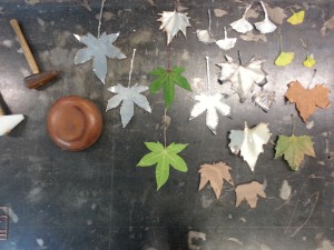A Collation of real and artificial leaves Omer made including Steel, Aluminium and wood.