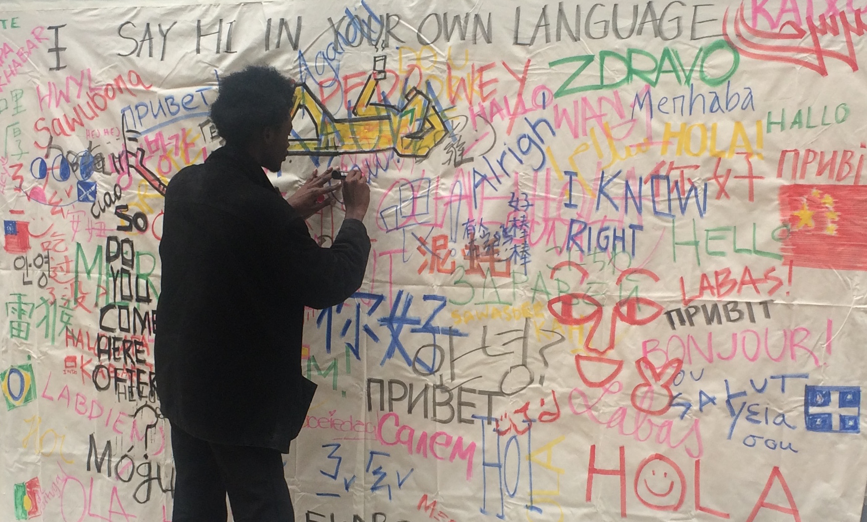 'Say hi in your own language', the Street, 26 October 2016