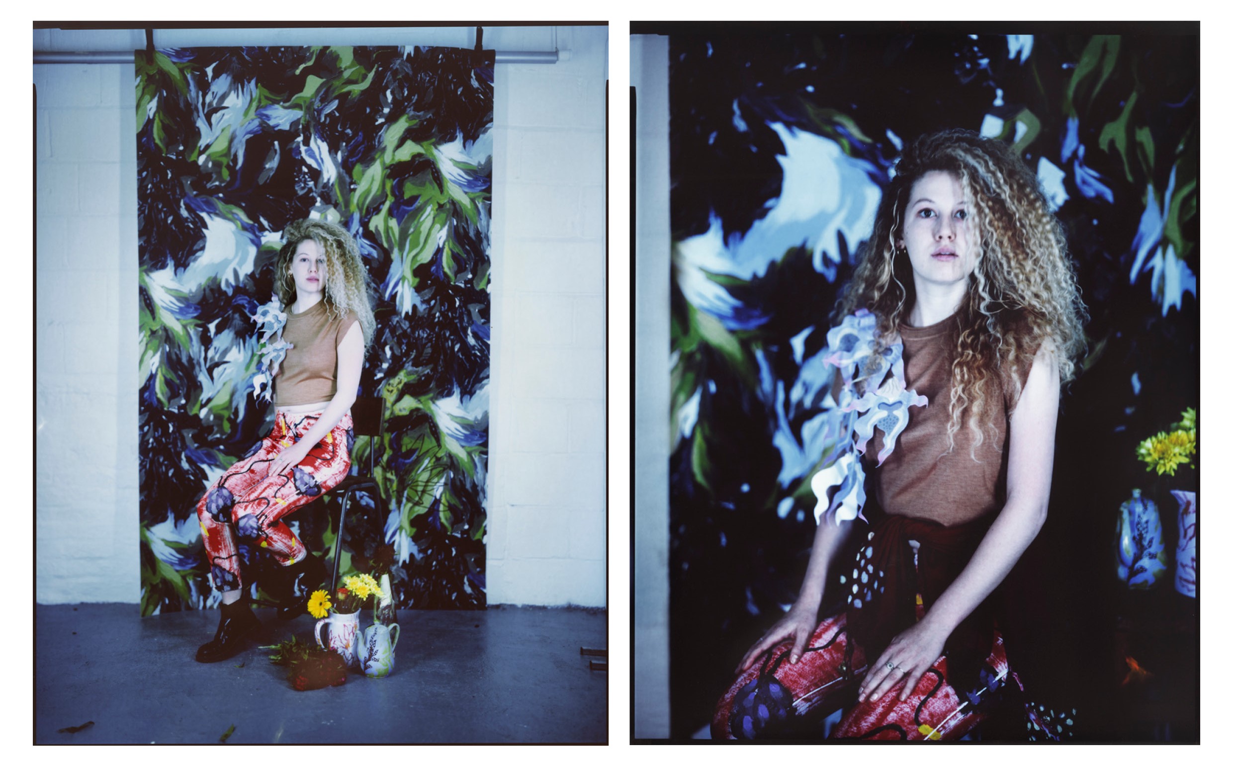 Model posed in front of printed fabric