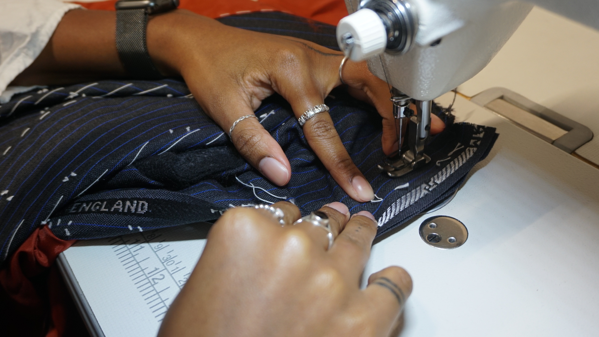  Takudzwa Chigaduro working at a sewing machine