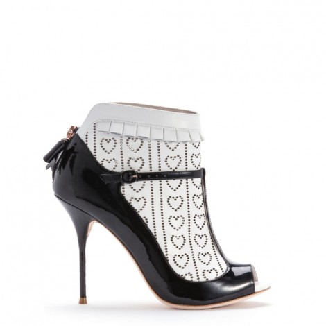 Sadie' by Sophia Webster. Black patent t bar with white calf laser cut sock detail. 