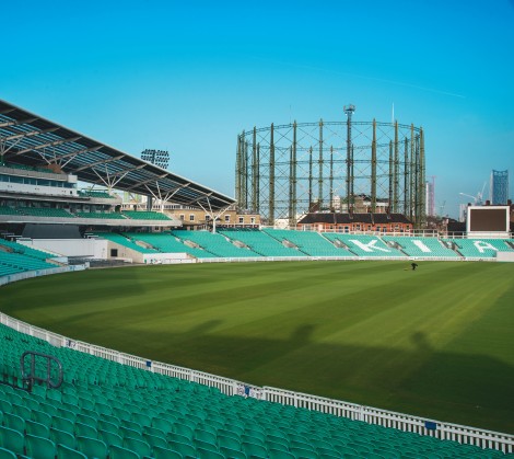 Football pitch with gasometer in background