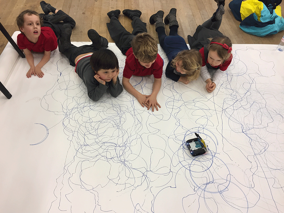 Young Visitors playing with our creative robot Picasso 2.0