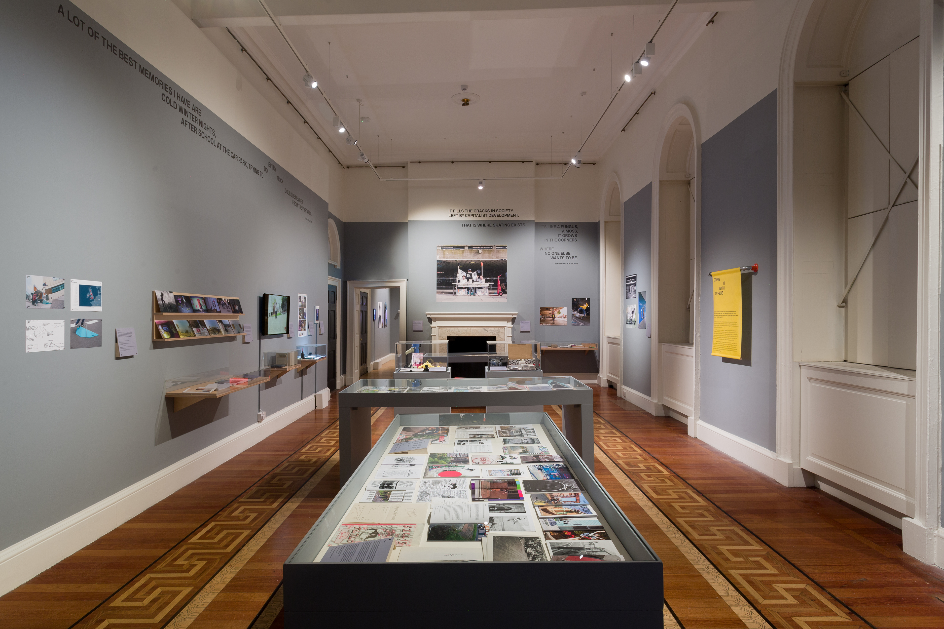 exhibition display case with parquet floor