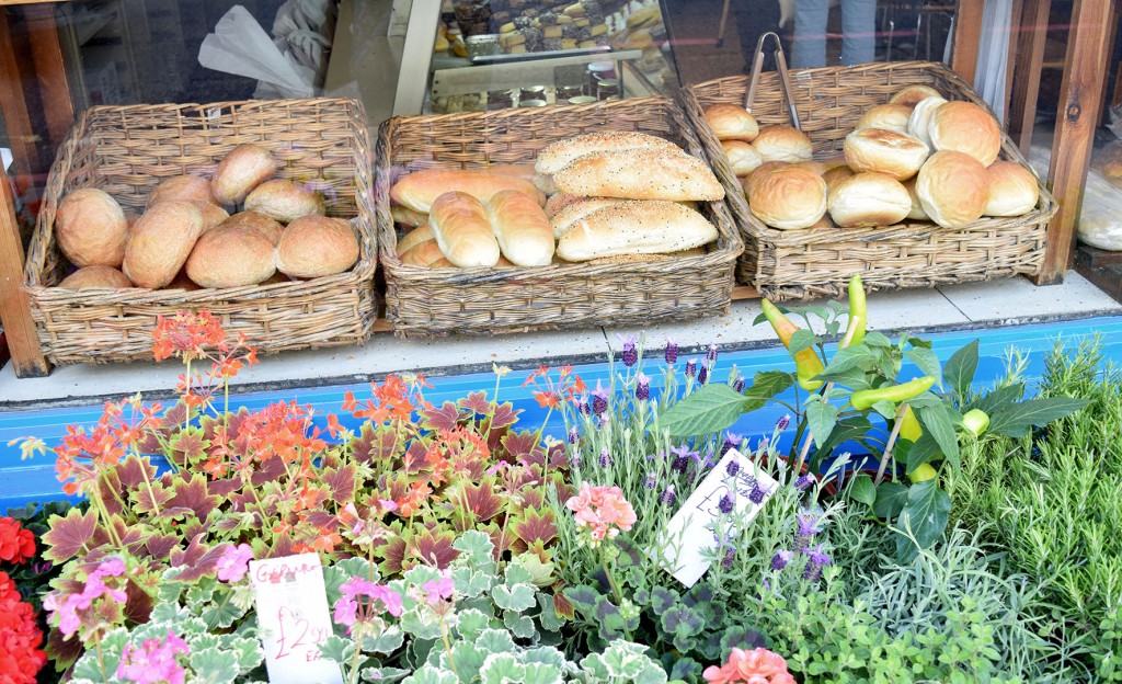 Photography of the Sophocles bakery rolls and flowers on display outside