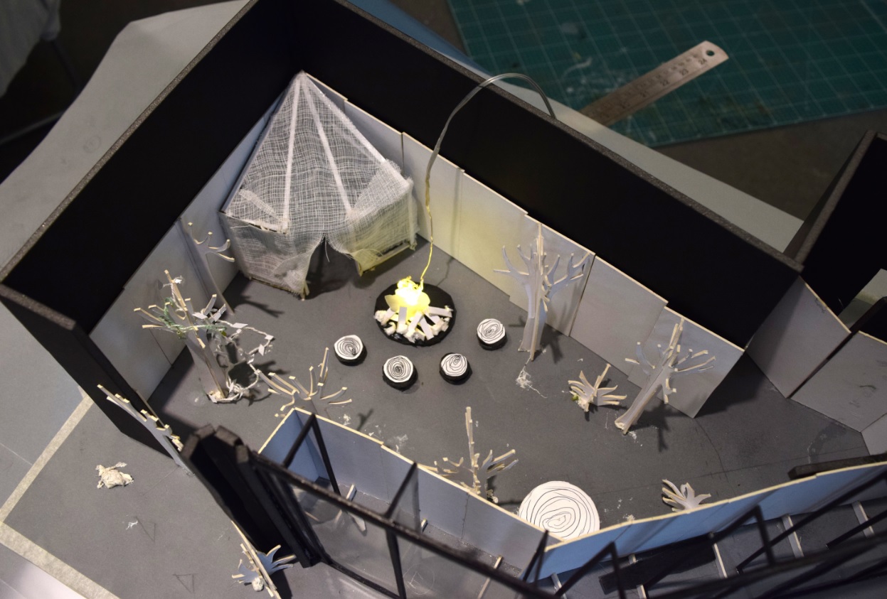 A white card model of the Virtually Summer set complete with light up campfire