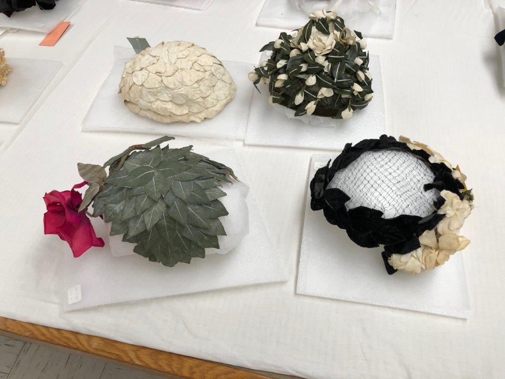 Group of rose adorned hats
