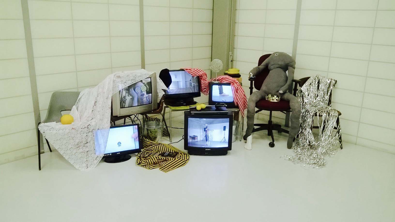 'Picasso Play!' 2016 - installation of chairs and tvs showing videos of rehearsals for 'Desire Caught By the Tail' and props from the outside production - Chelsea College of Arts