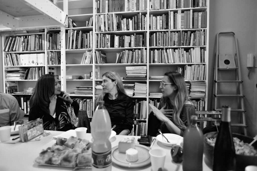 people talking over a table