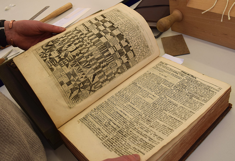 The book that MA Conservation student Sam Foley is working with