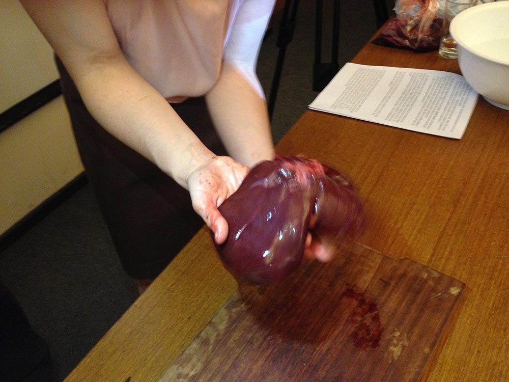 Documentation of A Woman Holding a Liver at Oxford Symposium of Food and Cookery, Saturday 9 July 2016. Image by Tom Gardner