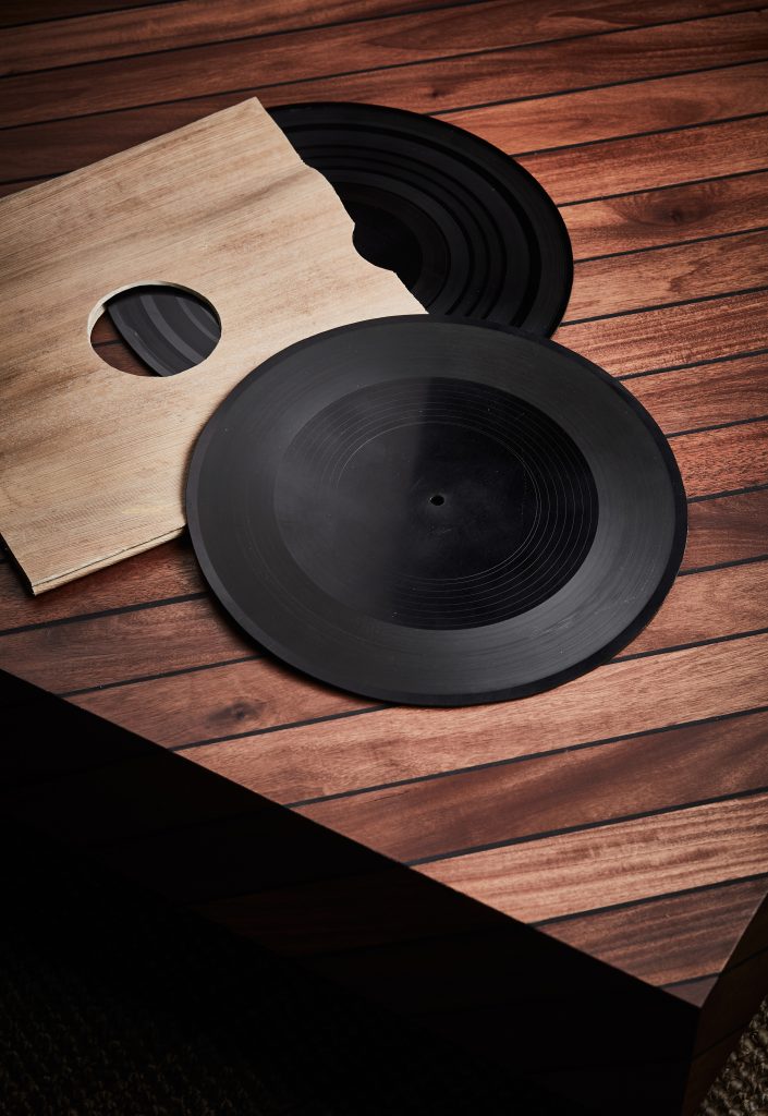 Record made from ebonite and record sleeve made from palm leather. Both by Studio Swine