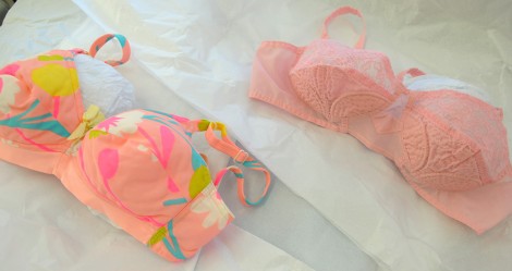 Two brightly coloured bras by Sears (1960s) and Debrette (1950s)