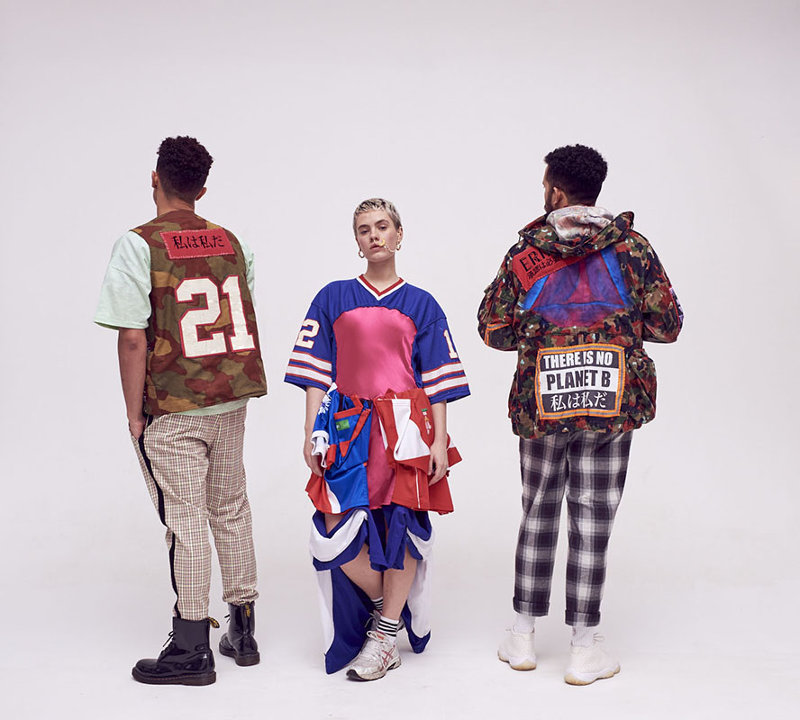 One woman and two men wearing colourful outfits