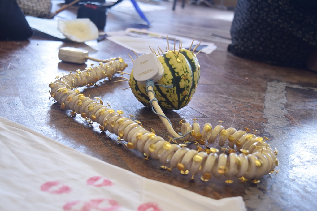 Found objects project work by Foundation student Nia Fekri. Pumpkin stidded with pins connected to wire plug