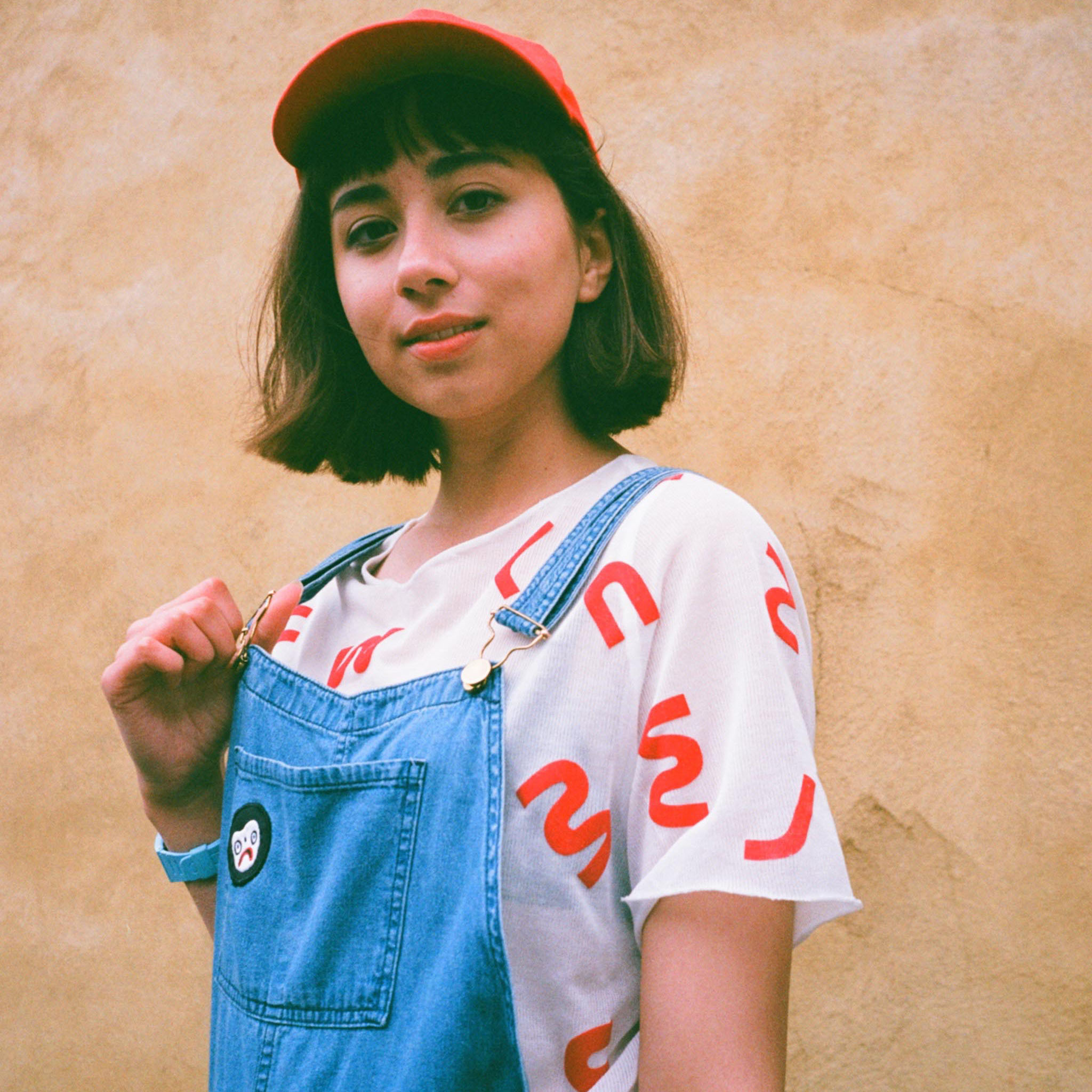 Flocked t-shirt and frown patch cropped. Photo taken by @bluelaybourne