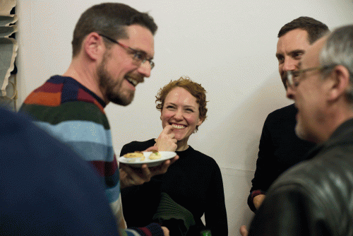 Guests chatting at event 