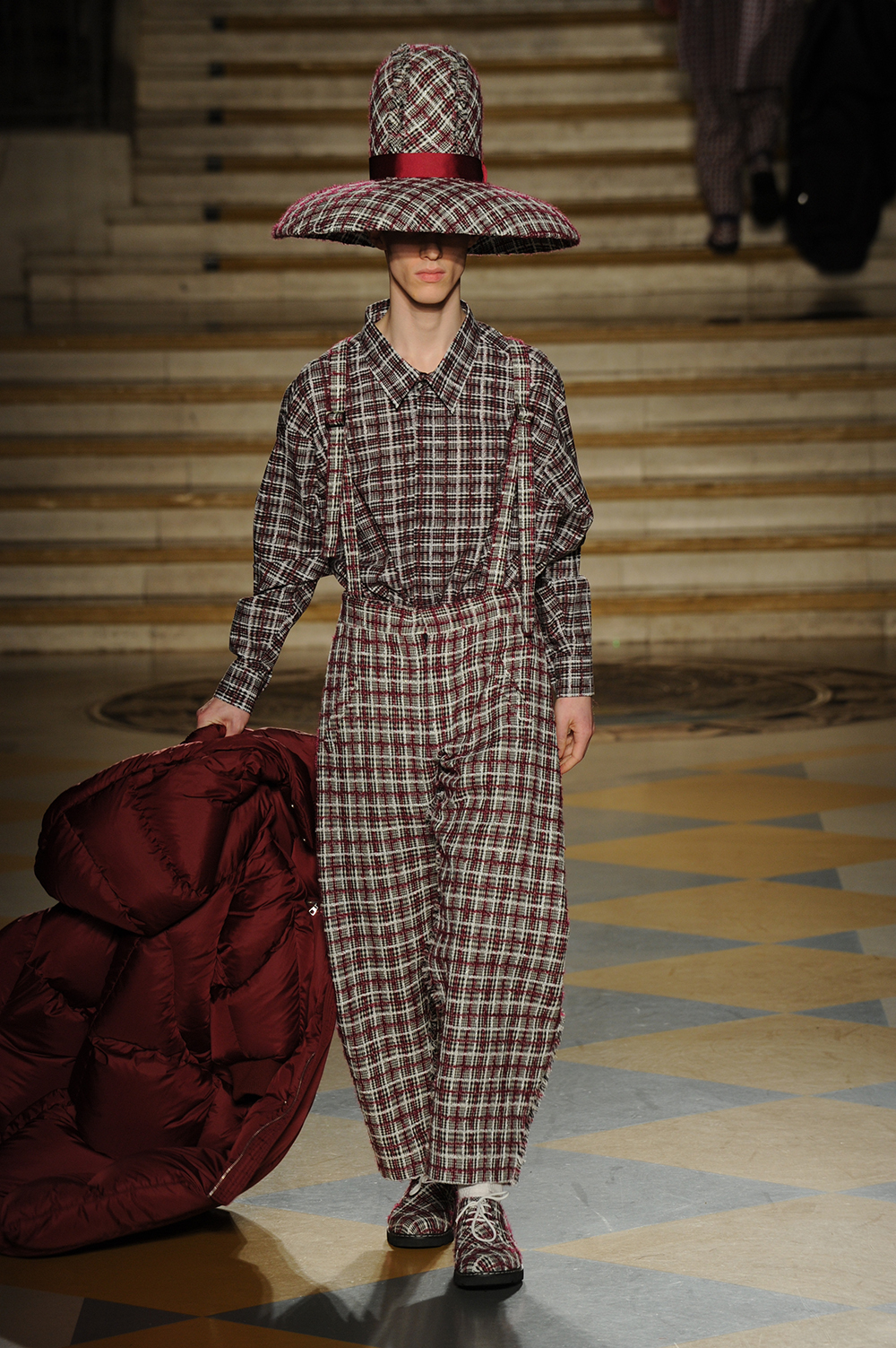 LCFMA16 Menswear student Peng Chen presenting his collection at this years catwalk show. Photo credit: Roger Dean