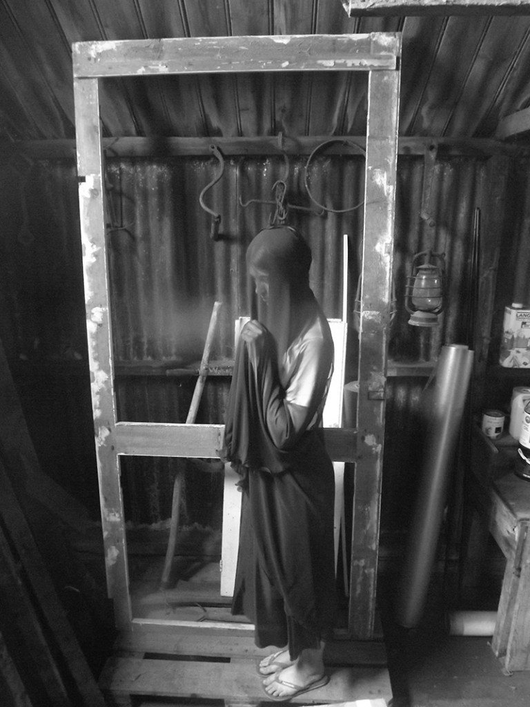 Black and White photograph by Briony Mitchell - figure draped in fabric