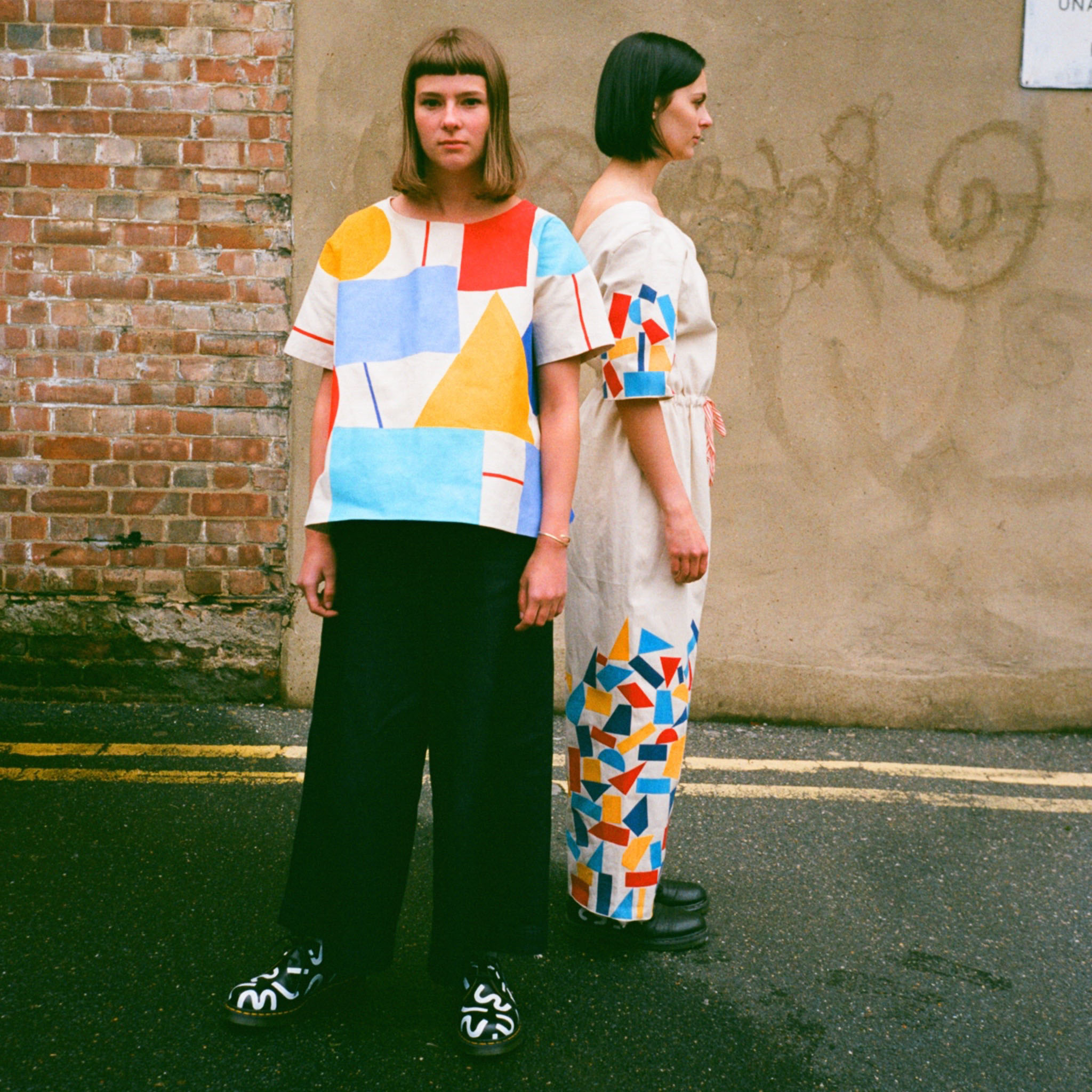 Printed top, customised Dr. Martens, and flocked jumpsuit. Photo taken by @bluelaybourne