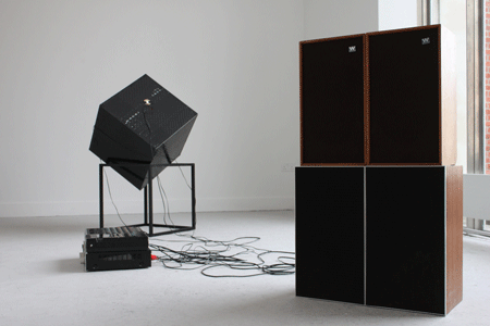 Nicky Teegan Prayer Battery 2012 Woven VHS tape, steel, contact microphones, tascam 4 track, integrated amplifier, 4 leak speakers, audio piece on endless loop cassette Dimensions variable, sculpture: 59 1/16 x 59 1/16 in. (150 x 150 cm) © Nicky Teegan Photo: the artist Courtesy White Cube 