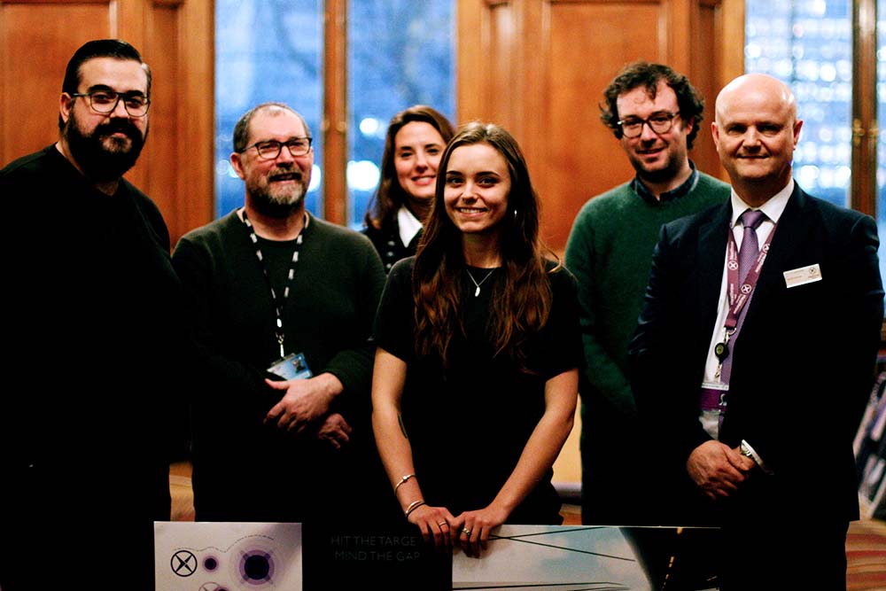 Hayley Wrighton with members of the judging panel.