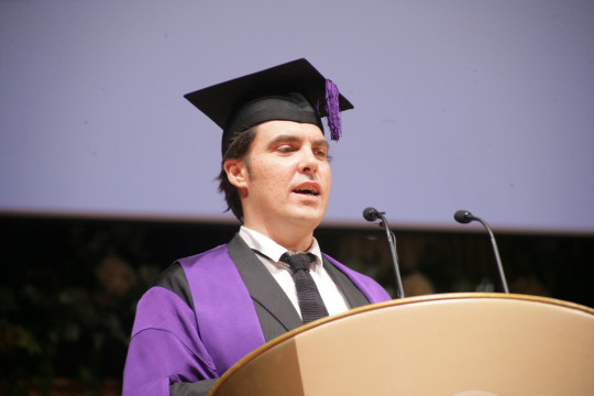 Joe Wright accepting his honorary fellowship from UAL