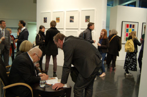 Sir-Peter-signing-books