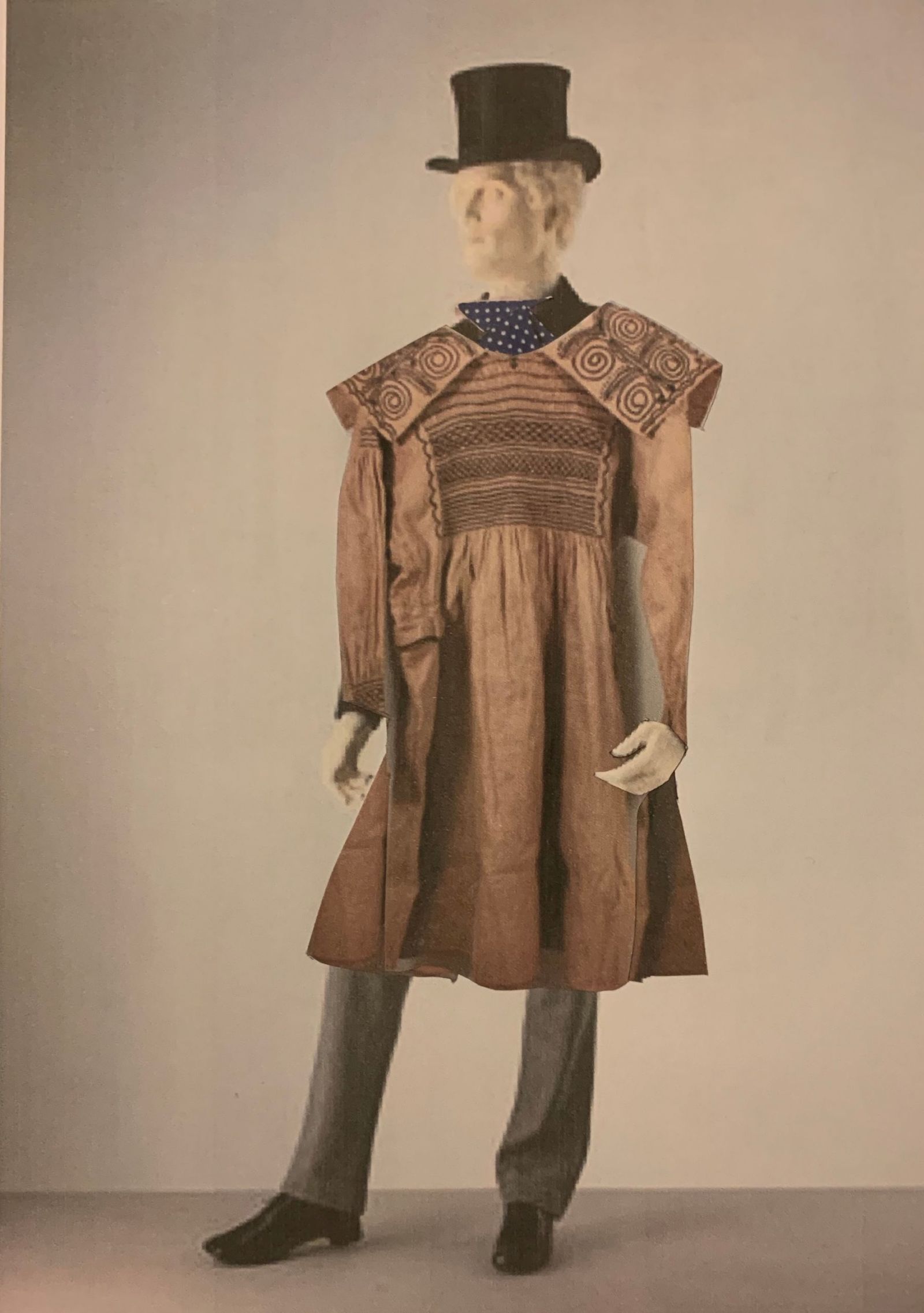 male mannequin in smock coat