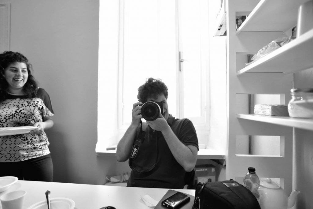 photographer looking through lense