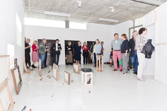 Brian Chalkley leading the guests on a tour of the Chelsea Degree Show