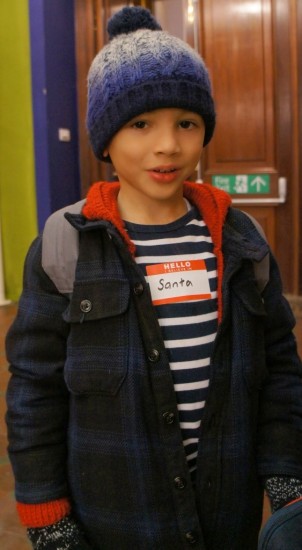 child with santa sticker