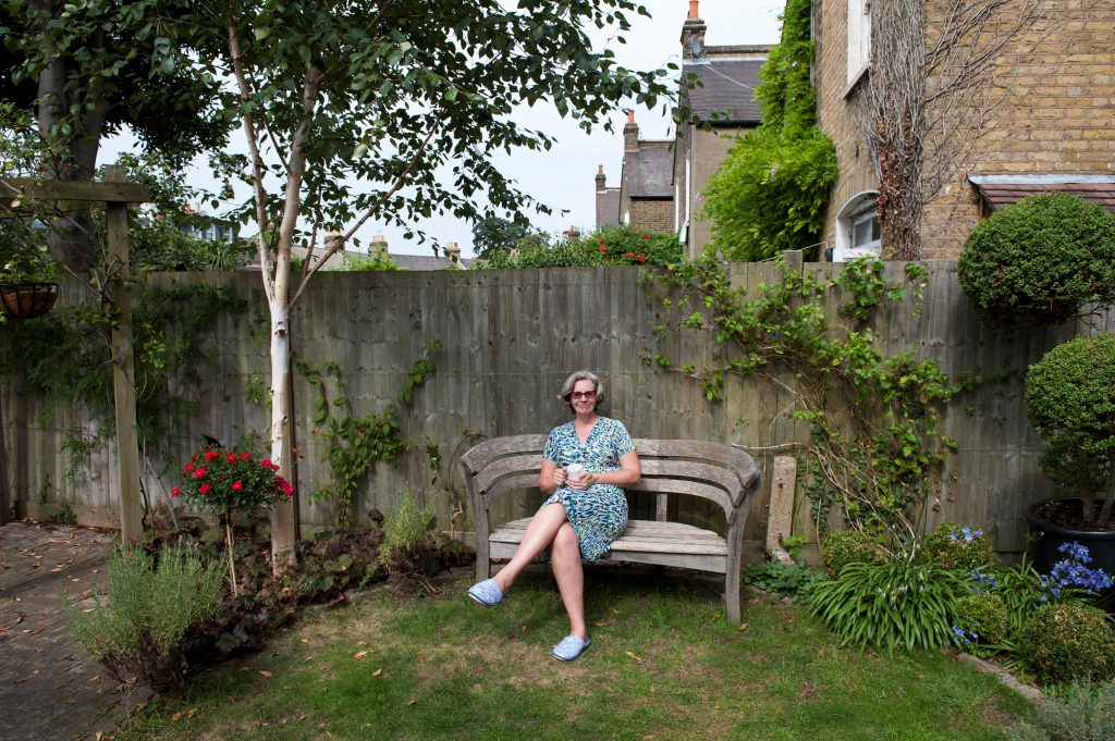 Gill in her house slippers with a cup of tea in Camberwell. Image by Mary Frances Scott.