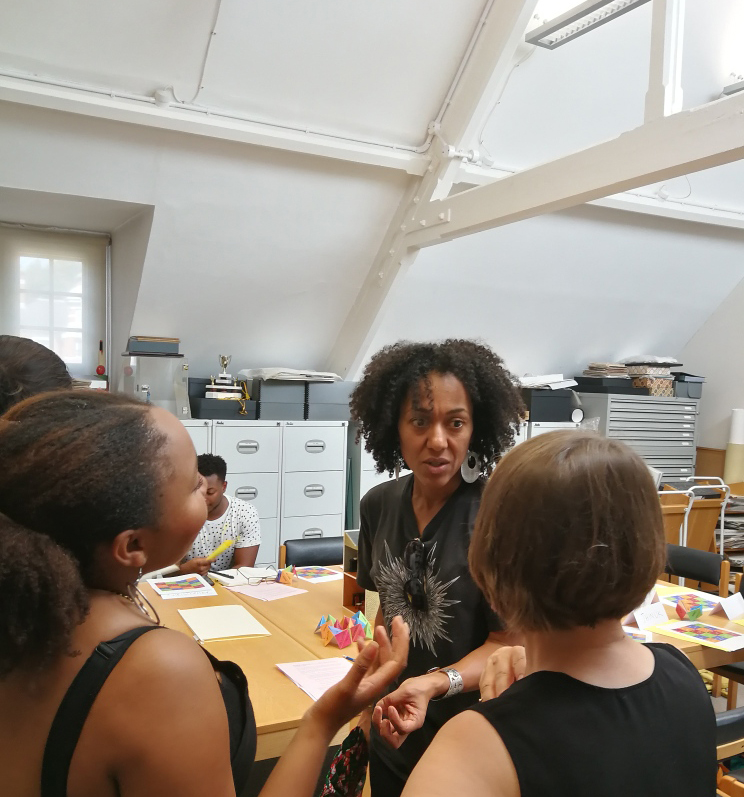 3 workshop participants engage in conversation