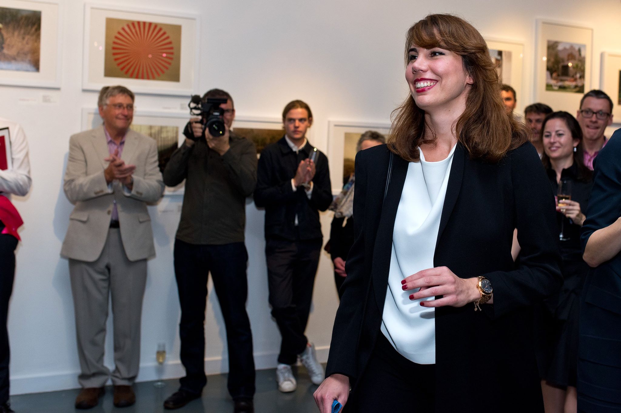 Berta accepts her award